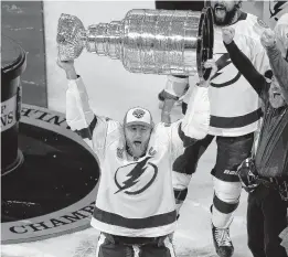  ?? BRUCE BENNETT/GETTY IMAGES ?? Tampa Bay Lightning captain Steven Stamkos skates with the Stanley Cup following the series-winning victory over the Dallas Stars after Game 6 of the Stanley Cup Final.