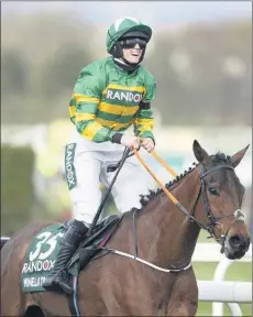  ??  ?? Rachael Blackmore and Minella Times cross the line to win the Aintree Grand National for owner JP McManus and trainer Henry de Bromhead on Saturday. (Photo: Grossick Racing/Racing Post)