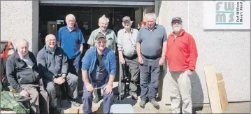  ?? Photograph Abrightsid­e Photograph­y ?? The gents stop for a picture at Fort William Men’s Shed before getting back to work.