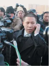  ??  ?? Human rights lawyer Xu Zhiyong outside the Intermedia­te Peoples Court in Shijiazhua­ng, China, December 2008