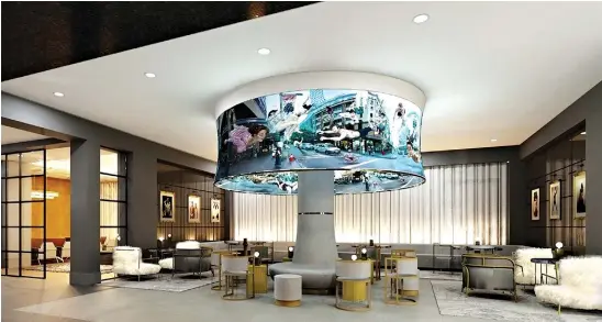  ?? Photos by Angad Arts Hotel ?? ■ Ever-changing video art gets displayed on a 360-degree screen on the “chameleon lamp” in the hotel lobby.