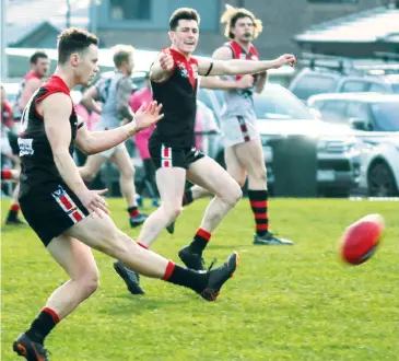  ??  ?? Warragul’s Michael Lynn clears from defence during the senior game against Maffra at Western Park on Saturday as the Gulls battled doggedly to overcome an early deficit. Warragul outscored the Eagles in the middle of the game but not enough to pull off a win.