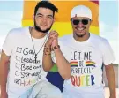 ?? Picture: EUGENE COETZEE ?? CELEBRATIN­G DIVERSITY: Lorraine couple Deon Strydom, left, and Ralton Africa celebrated the NMB LGBTIQ+ community at NMB Pride 2018 at the Donkin Reserve on Saturday
