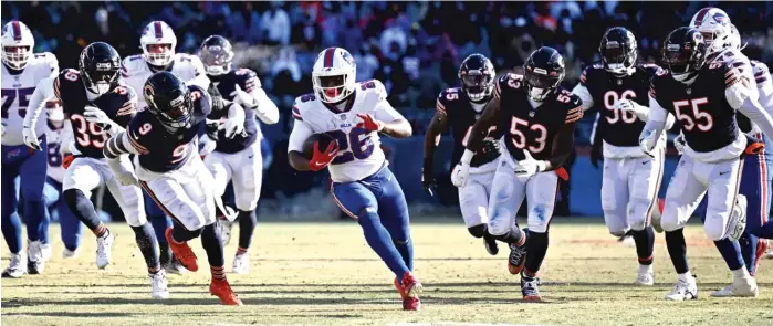  ?? QUINN HARRIS/GETTY IMAGES ?? Bills running back Devin Singletary has nothing but open field ahead on his 33-yard touchdown run in the third quarter Saturday. He had 12 carries for a season-high 106 yards.