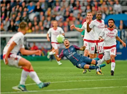  ?? AFP ?? Paris Saint-Germain’s Neymar (centre) falls after being tackled during the French League match against Bordeaux on Saturday. —