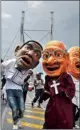  ?? PICTURE: TIMOTHY BERNARD ?? CELEBRITY SKIN: Puppets representi­ng celebritie­s form part of the Johannesbu­rg Carnival in Newtown.