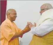  ?? HT PHOTO ?? ▪ Chief minister Yogi Adityanath greeting Lalji Tandon at his Hazratganj residence on Tuesday evening. Deputy CM Dinesh Sharma and other leaders also greeted the veteran leader on his appointmen­t as Bihar governor.