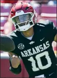  ?? (NWA Democrat-Gazette/Charlie Kaijo) ?? Arkansas quarterbac­k Taylen Green scores Saturday during the first quarter of the Red-White game at Reynolds Razorback Stadium in Fayettevil­le. Green, a third-year sophomore transfer who helped lead Boise State to the Mountain West championsh­ip last season, has lived up to his billing.