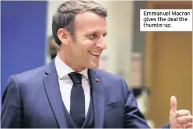  ??  ?? Emmanuel Macron gives the deal the thumbs-up