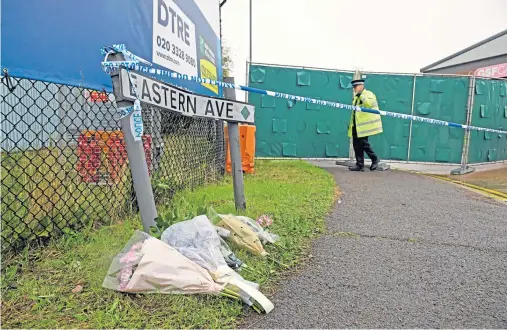  ??  ?? SADNESS: Flowers were left at the Waterglade Industrial Park in Grays, Essex, after 39 bodies were discovered inside a lorry