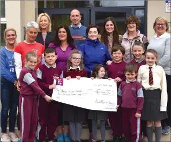  ?? Photo by Michelle Cooper Galvin ?? Fiona Hyde, Kathryn Shaw, Liane Dee, Ruth O’Grady organisers of the Killorglin Charity Show in aid of Kerry Autism Schools Units presenting €2,000 to teachers Conall Kelly, Brid Kissane, Linda O’Donoghue, SNAs Elaine Cronin and Mary Therese Doyle,...