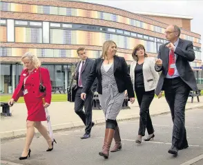  ??  ?? The Secretary of State Karen Brady visits Loughborou­gh College. From left to right: Chair of Loughborou­gh College governors, Audrey Traynor, Private secretary Adam Conant, Secretary of State for digital, culture, media and sport Karen Bradley,...