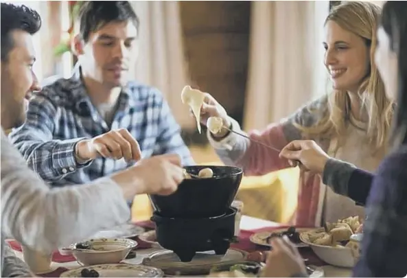  ??  ?? Fondue pots are making a comeback