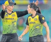  ?? AFP ?? Megan Schutt (right) is wary of bowling to the India openers in the n
Powerplay of the T20 women's World Cup final.