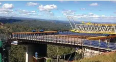  ??  ?? MILESTONE REACHED: The massive size of the Toowoomba Second Range Crossing project is shown in new photos.