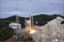  ?? KOREAN CENTRAL NEWS AGENCY — KOREA NEWS SERVICE VIA AP, FILE ?? This photo shows what North Korea says is a launch of the new Chollima-1rocket carrying the Malligyong-1satellite at the Sohae Satellite Launching Ground on May 31.