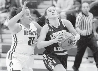  ?? DYLAN SLAGLE/BALTIMORE SUN MEDIA GROUP ?? Gerstell's Gabby Manning fouls Liberty's Jordan Nastos in the fourth quarter of their game in Finksburg on Friday.