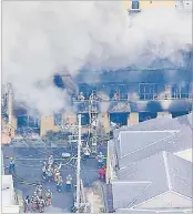  ?? Picture: AFP ?? An aerial photo shows the fire site burning with fire in Kyoto yesterday.