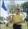  ?? NEWS PHOTO RYAN MCCRACKEN ?? Lanny Seefried stands with the Redcliff Open trophy after winning the championsh­ip Sunday at Riverview Golf Club.