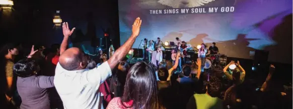  ?? JESSE WINTER/TORONTO STAR ?? The Vantage Church band plays to a packed house at the Cineplex theatre in Markham during services on a recent Sunday.