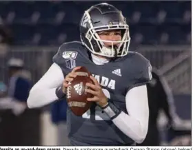  ??  ?? Despite an up-and-down season, Nevada sophomore quarterbac­k Carson Strong (above) helped the Wolf Pack go 3-3 on the road last year under Coach Jay Norvell. Nevada will be Arkansas’ first opponent this season.
(AP/Tom R. Smedes)