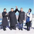  ?? SOURCE: PYONGYANG PRESS CORPS ?? South Korean President Moon Jae-in, second from right, and his wife, Kim Jung-sook, right, stand with North Korean leader Kim Jong Un, second from left, and his wife Ri Sol Ju on Mount Paetku in North Korea.