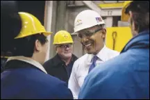  ?? GABRIELLA DEMCZUK / THE NEW YORK TIMES FILE (2013) ?? President Barack Obama meets with workers in November 2013 while touring a steel plant in Cleveland. The same gauges that illustrate the Trump administra­tion’s economic successes also make clear that they are built on the achievemen­ts of the previous one, and that the economy is following the upward trajectory begun under Obama.