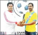  ??  ?? Man of the Match - Anthony Rego of KGA receives the award from Claro Fernandes.