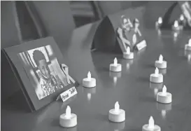  ?? LILY SMITH/THE REGISTER ?? Victims of gun violence are remembered during a vigil at the Iowa State Capitol on Jan. 27.