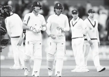  ??  ?? England’s Jason Roy and Joe Denly leave the pitch at stumps . (Reuters photo)