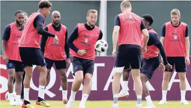  ?? AP PHOTO ?? England’s players attend official training in Repino near St Petersburg, Russia, yesterday on the eve of their FIFA World Cup Group G match against Tunisia in the Volgograd Arena.