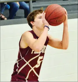  ?? PHOTOS BY WILLIAM HARVEY/RIVER VALLEY & OZARK EDITION ?? Perryville senior Chandler Roland, the River Valley & Ozark Edition Boys Basketball Player to Watch, attempts a 3-pointer in practice.