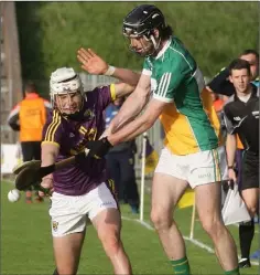  ??  ?? Rory O’Connor closes down Offaly captain Ben Conneely.