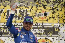  ?? JOHN LOCHER - THE ASSOCIATED PRESS ?? Kyle Larson celebrates after winning Sunday’s NASCAR Cup Series auto race in Las Vegas.