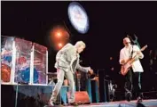  ?? Michael Robinson Chavez
Los Angeles Times ?? THE WHO’S Roger Daltrey, left, and Pete Townshend perform a track from “Quadrophen­ia” in L.A.