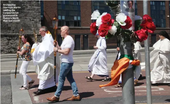  ??  ?? Archbishop Diarmuid Martin leading the Corpus Christi procession in Dublin’s North Wall last month