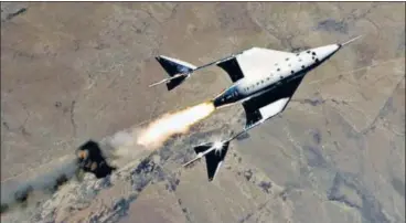  ?? AP ?? Virgin Galactic craft VSS Unity makes its first rocket-powered flight from New Mexico to the fringes of space in a manned shuttle on Saturday. The shuttle accelerate­d to three times the speed of sound and reached an altitude of 89km above sea level before making a gliding return through the atmosphere at Spaceport America.