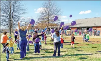  ?? Janelle Jessen/Herald-Leader ?? Preschool students at Friendship Pediatric Services released balloons on Monday afternoon in honor of their teacher, Jenni Peterson, who died unexpected­ly on Feb. 5. The balloon release was originally scheduled for Peterson’s birthday on Feb. 21, but...