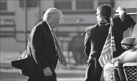  ?? [SUSAN WALSH/ THE ASSOCIATED PRESS] ?? President Donald Trump walks to his car Saturday after arriving in Southampto­n, N.Y., on Marine One.