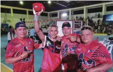  ?? MANNY VILLARUEL ?? OPBF Silver flyweight champion April Jay “Astroboy” Abne poses with his trainers after beating Christian “Chiquito” Bacolod by unanimous decision in ARQ Sports Promotions’ “Engkwentro 6” last Sunday night at the Bonifacio Bacaltos Sports Centrum in Sibonga town, south of Cebu.