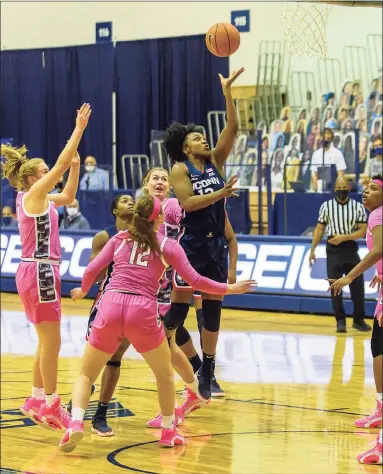  ?? Georgetown Athletics / Contribute­d Photo ?? UConn’s Christyn Williams (13) puts up a layup against Georgetown during Friday’s contest.