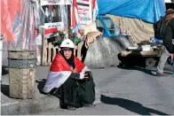  ?? Associated Press ?? ■ A woman takes part in the ongoing anti-government protests Saturday in Tahrir Square, Baghdad.