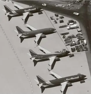  ?? Ethan Miller / Getty Images ?? Southwest jets are parked at Mccarran Airport on May 21. Las Vegas, along with Denver, Dallas and Houston, will receive an increased number of daily flights out of San Antonio Airport.