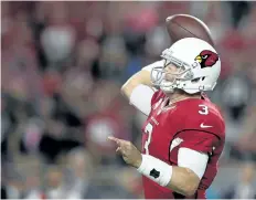  ?? CHRISTIAN PETERSEN/GETTY IMAGES FILES ?? Arizona Cardinals’ quarterbac­k Carson Palmer throws a pass during the second quarter of the NFL game against the New York Jets at the University of Phoenix Stadium, on Oct. 17, 2016, in Glendale, Ariz.