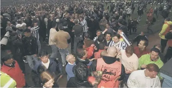  ?? ?? Brighton and Hove Albion fans invade the pitch on the referees final whistle of the Division Three match between against Doncaster Rovers, which was the last game ever to be played at The Goldstone. Picture: Ross Kinnaird/Allsport