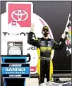  ??  ?? Grant Enfinger celebrates after winning a NASCAR Truck Series auto race on Sept 10 in Richmond, Vir
ginia. (AP)