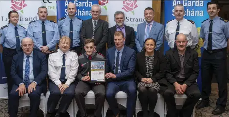  ?? Photo by Domnick Walsh ?? Merit Award winner Daniel Cremin at the Lee Strand Garda Youth Achievemen­t Awards in the Ballyroe Heights Hotel on Friday. Also pictured were Lee Strand board members, family and Garda staff.