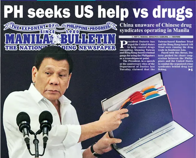  ??  ?? UPDATED DRUG LIST – President Duterte presents the updated list of prominent drug personalit­ies during his keynote speech at the 56th anniversar­y of the Philippine Constituti­on Associatio­n (Philconsa) at the Manila Hotel Tuesday night. (Jay Ganzon)