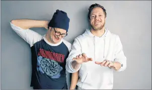  ?? PHOTO BY TAYLOR JEWELL/INVISION/AP ?? Director Don Argott, left, and Dan Reynolds pose for a portrait to promote the film, “Believer”, at the Music Lodge during the Sundance Film Festival on Jan. 21 in Park City, Utah. The Mormon frontman of the Imagine Dragons rock band hopes the Sundance...