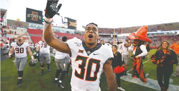  ?? THE ASSOCIATED PRESS ?? Oklahoma State’s Chuba Hubbard was angry his coach wore a shirt that promoted a news organizati­on that called the Black Lives Matter movement a “farce.”